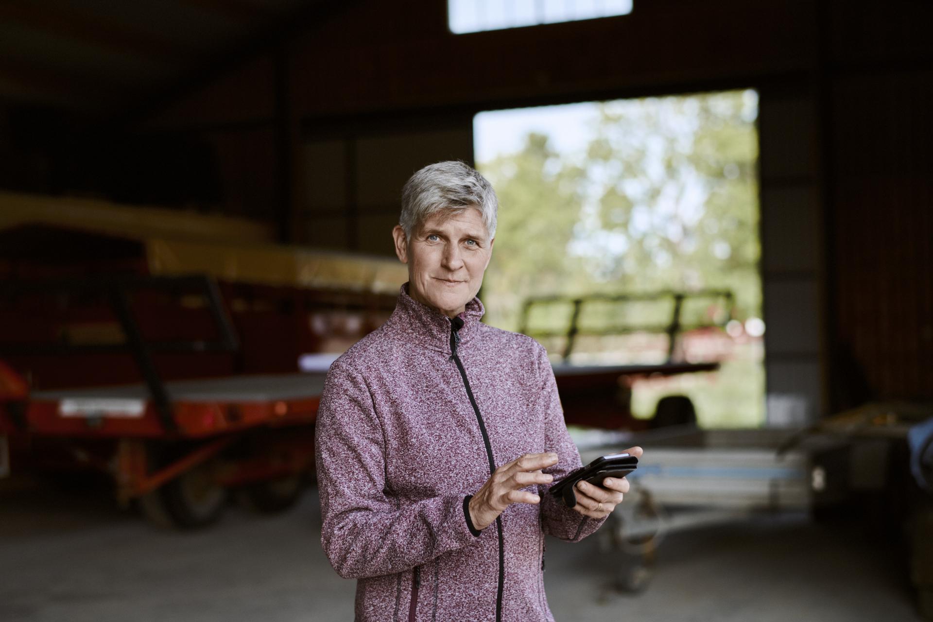 Female farmer using the app